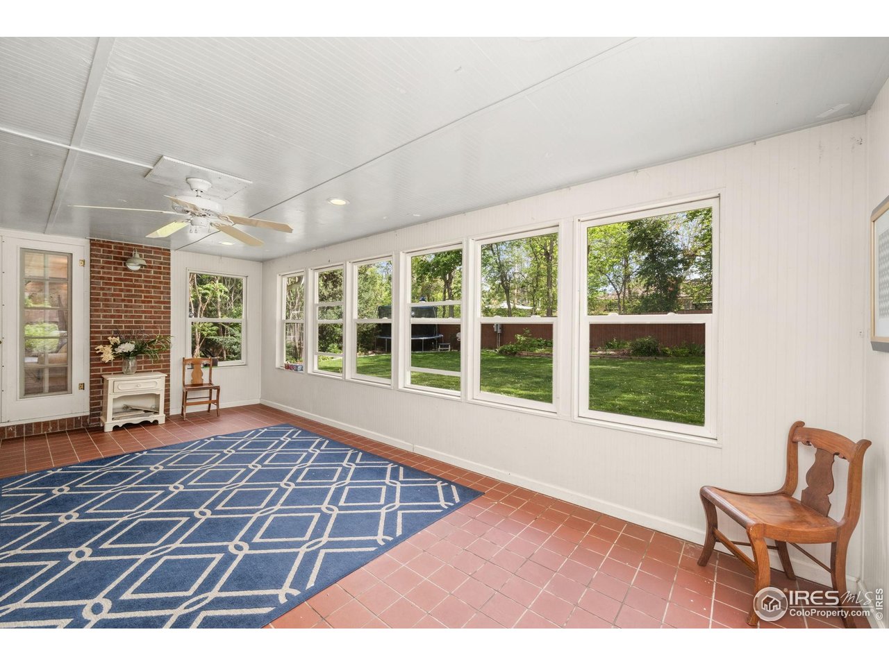 2114 18th Street Road Greeley, CO 80631 - Photo 19 of 35 Huge sunroom