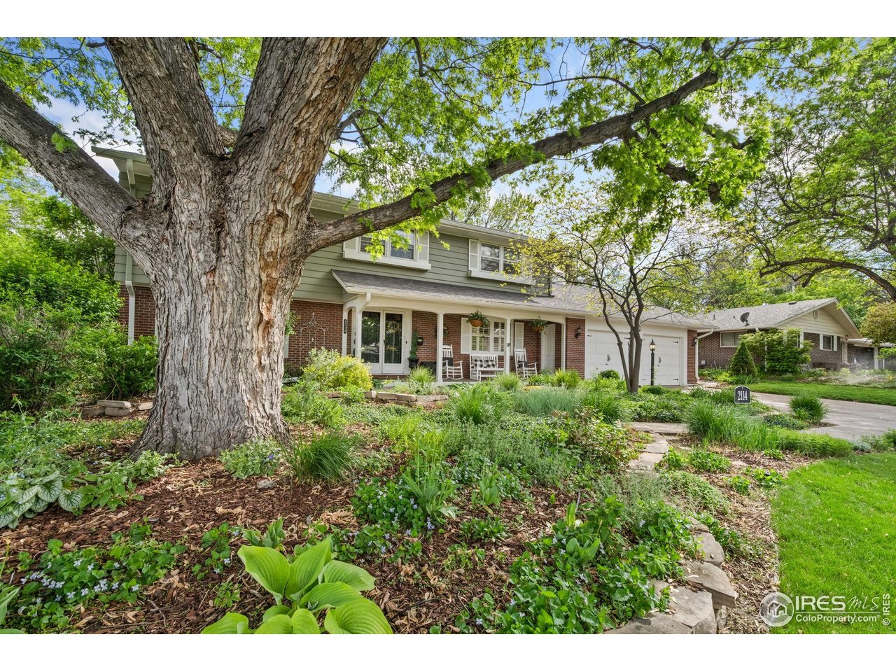 2114 18th Street Road Greeley, CO 80631 - Photo 3 of 35 You will love the mature trees and landscaping