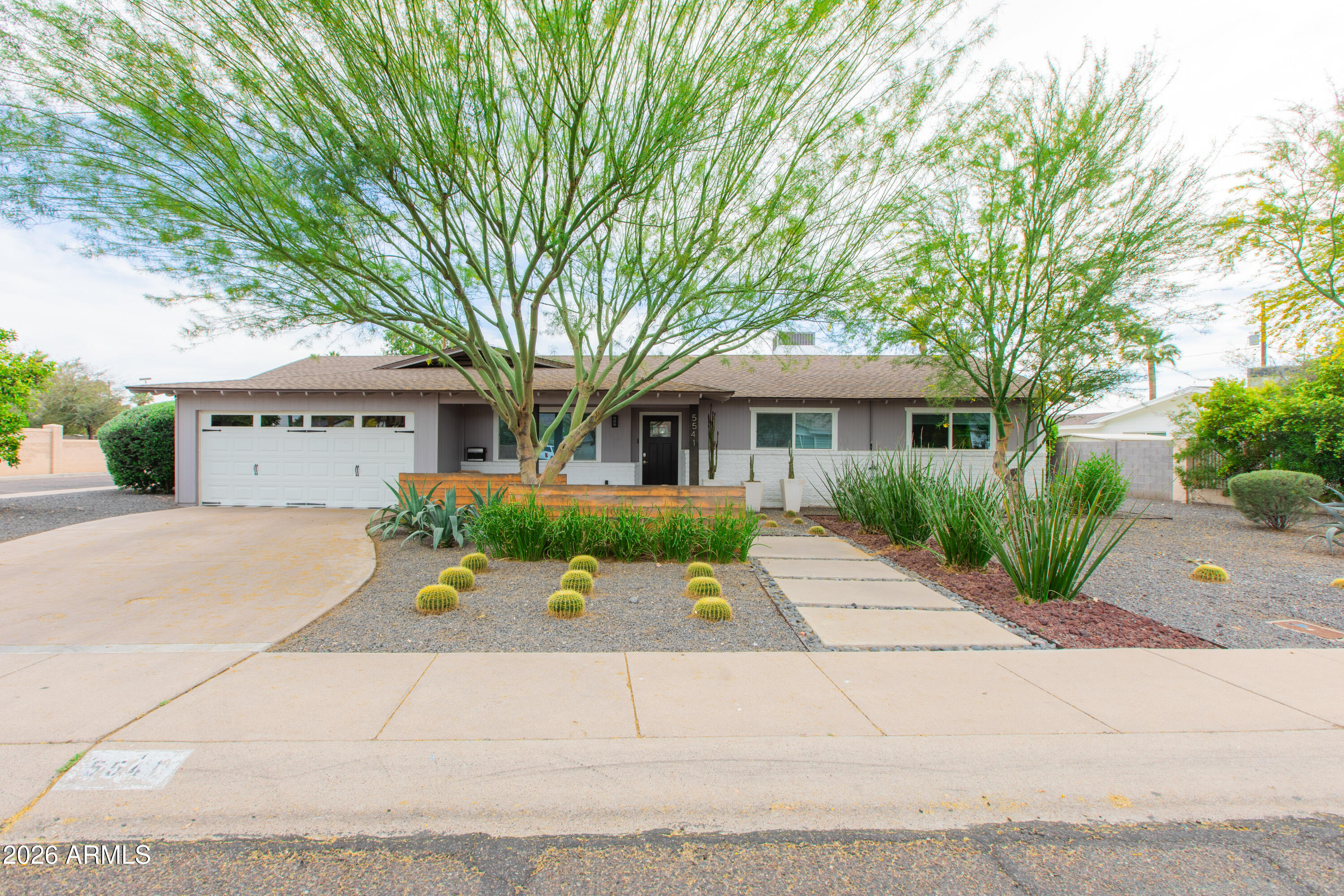 5541 East Cheery Lynn Road Phoenix, AZ 85018 - Photo 1 of 69 front view of a house with a small yard