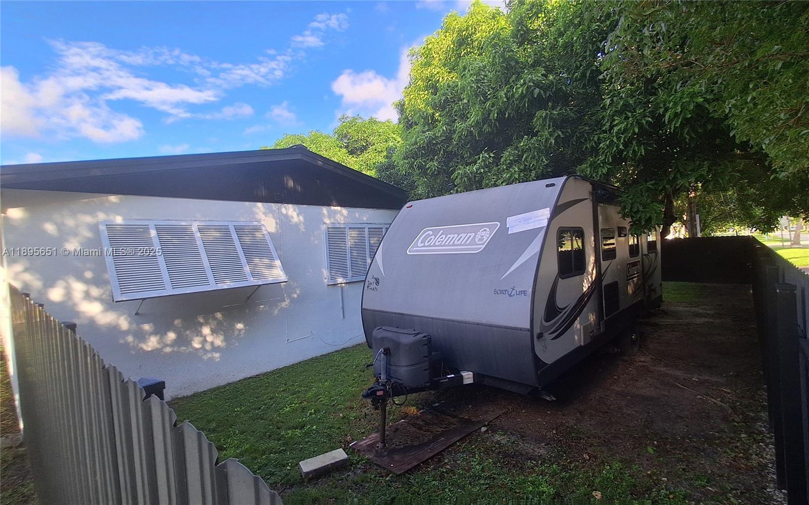 10305 Southwest 149th Terrace Miami, FL 33176 - Photo 34 of 39 a aerial view of a house