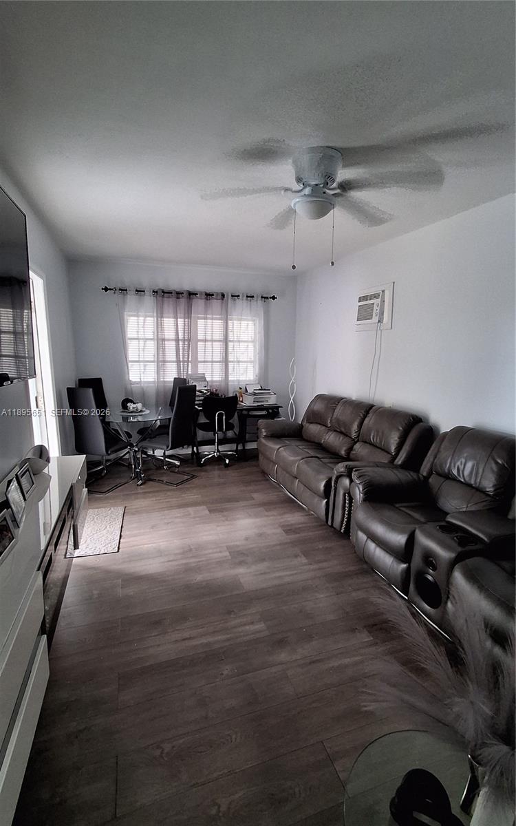10305 Southwest 149th Terrace Miami, FL 33176 - Photo 56 of 58 a living room with furniture