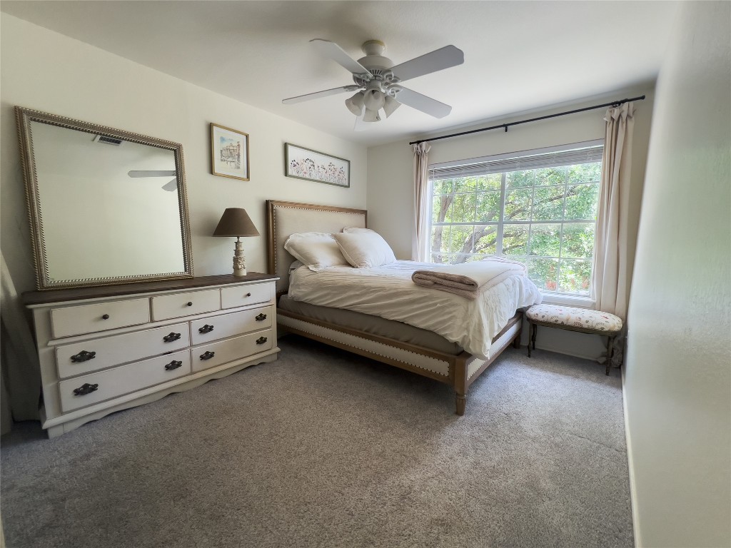 8908 West Hove Loop Austin, TX 78749 - Photo 14 of 20 a bed room with a bed and a window