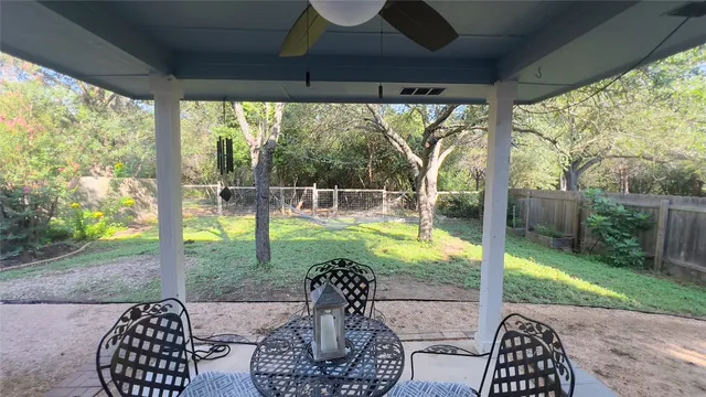a view of a livingroom with furniture and a fireplace