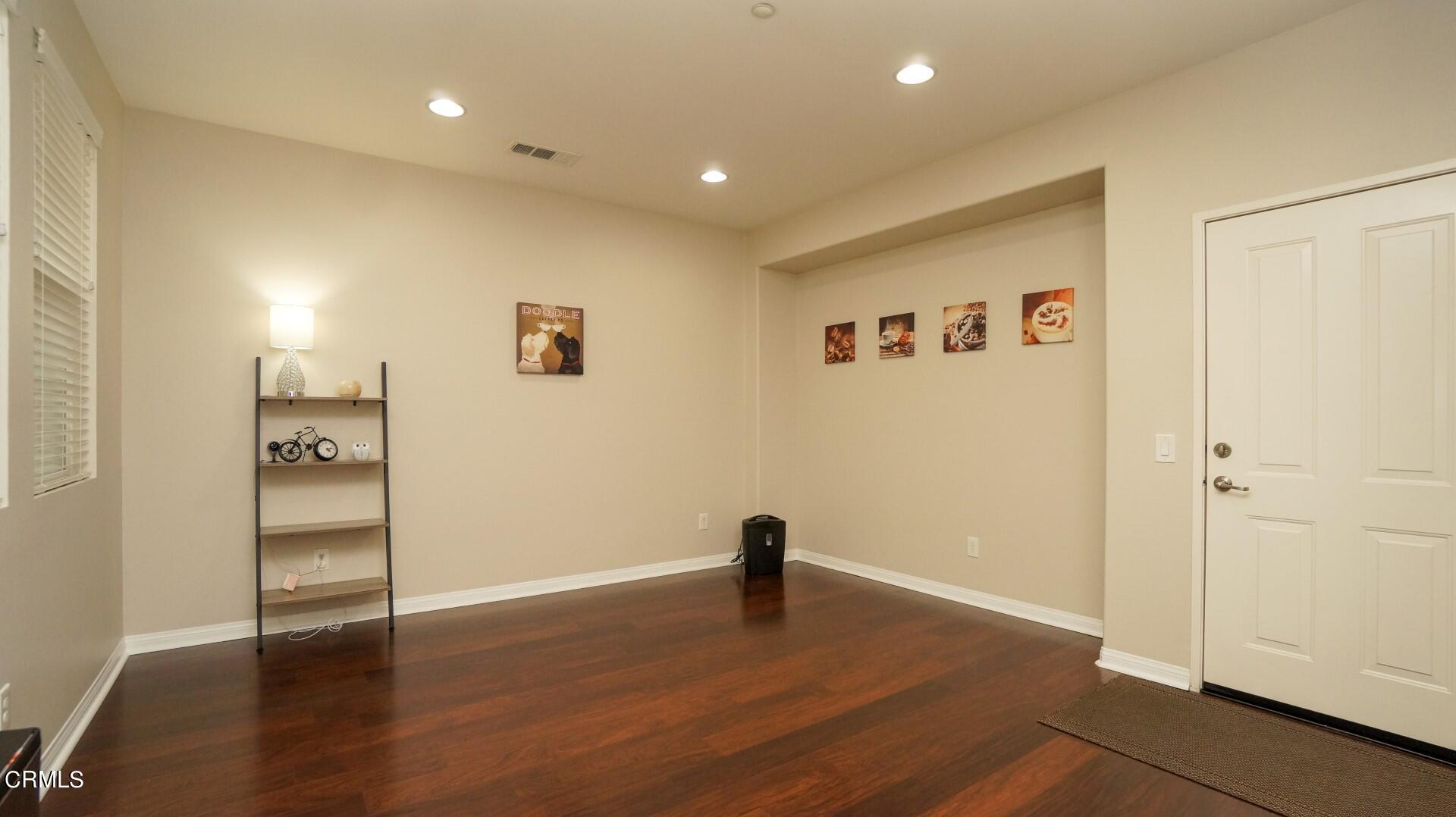 729 Forest Park Boulevard Oxnard, CA 93036 - Photo 8 of 27 a view of empty room with wooden floor