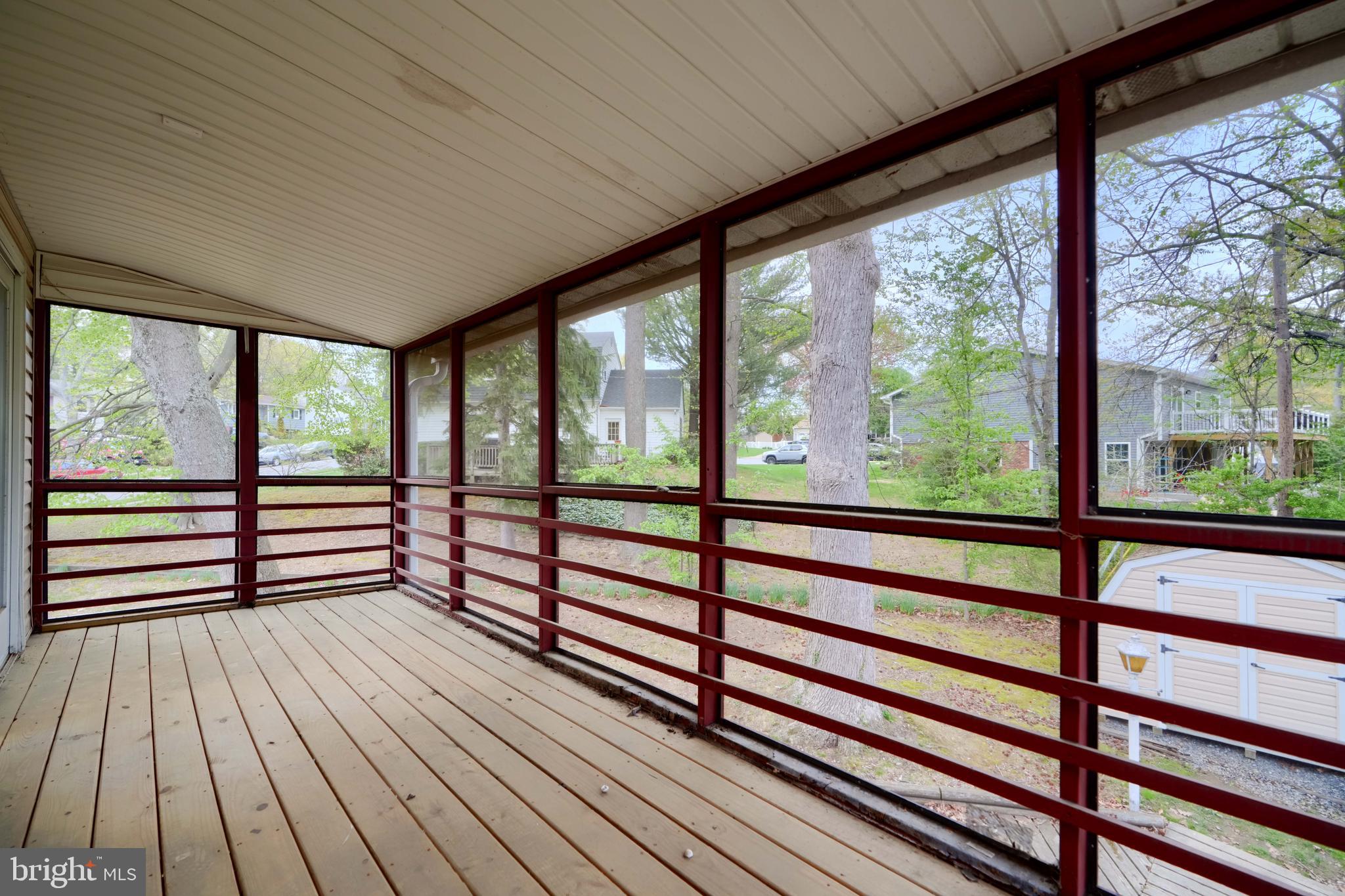 113 Doncaster Road Joppa, MD 21085 - Photo 17 of 43 wooden floor in an empty room with wooden floor next to a large window