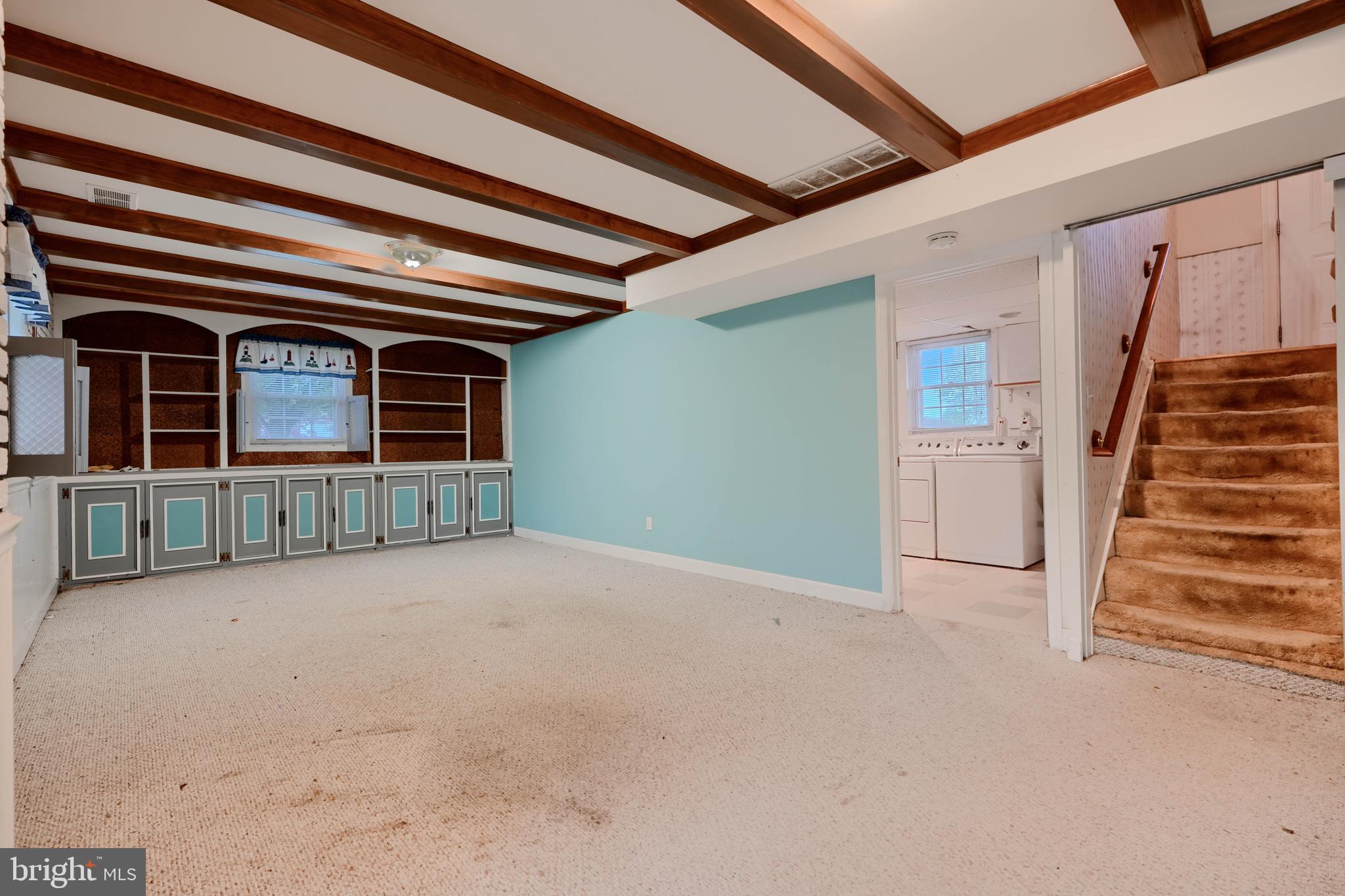 113 Doncaster Road Joppa, MD 21085 - Photo 29 of 43 a view of an empty room with stairs