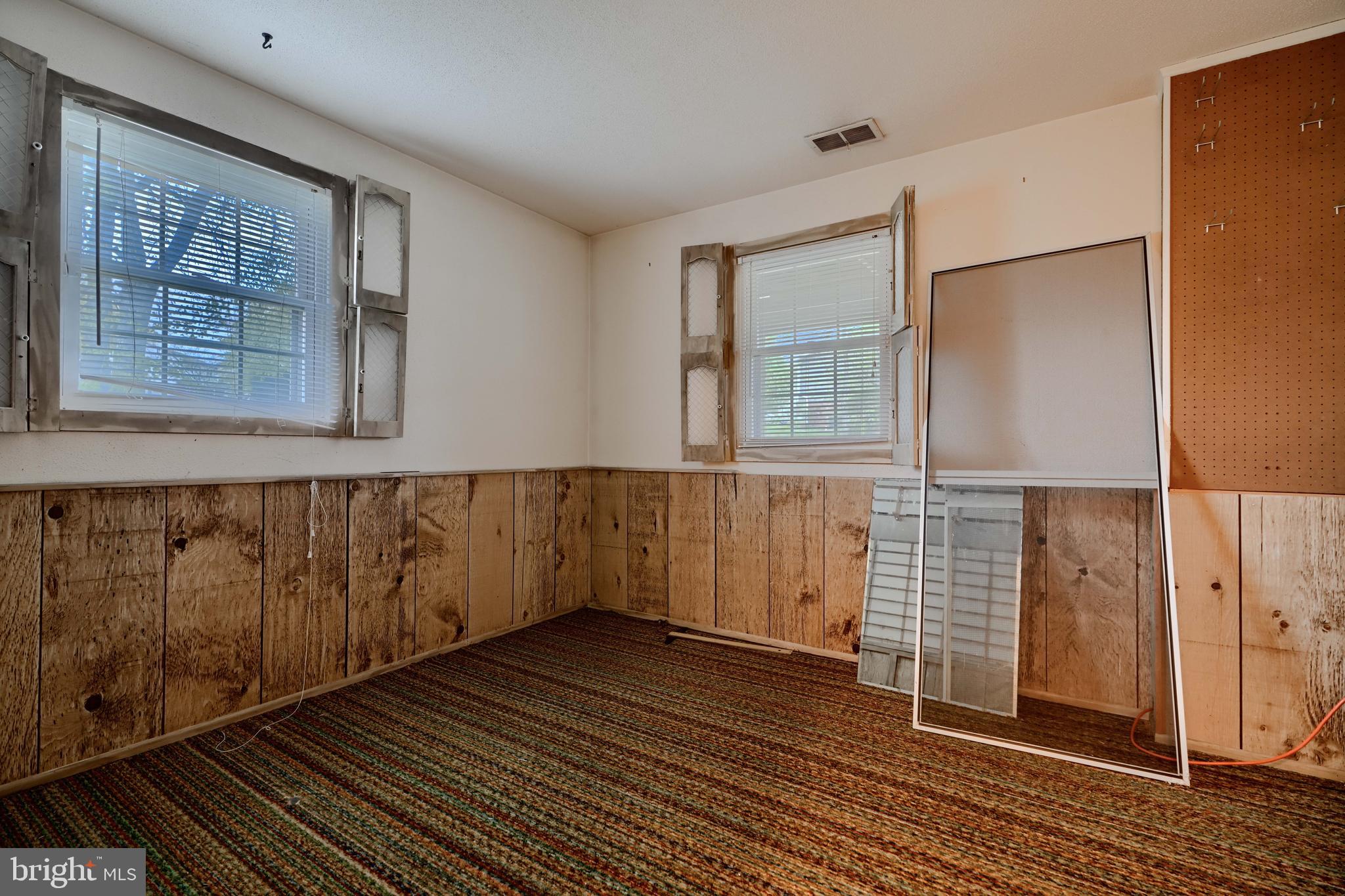 113 Doncaster Road Joppa, MD 21085 - Photo 34 of 43 an empty room with wooden floor and windows