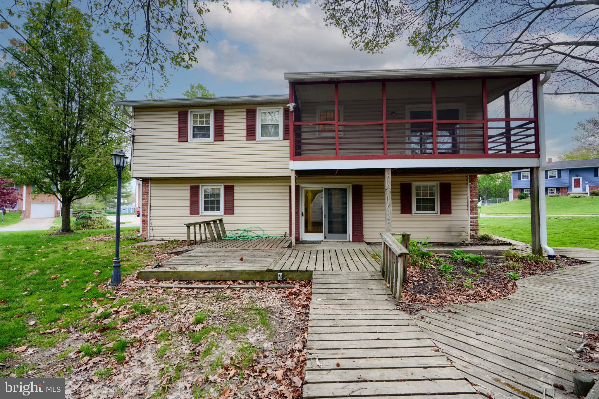 113 Doncaster Road Joppa, MD 21085 - Photo 41 of 43 a front view of a house with garden