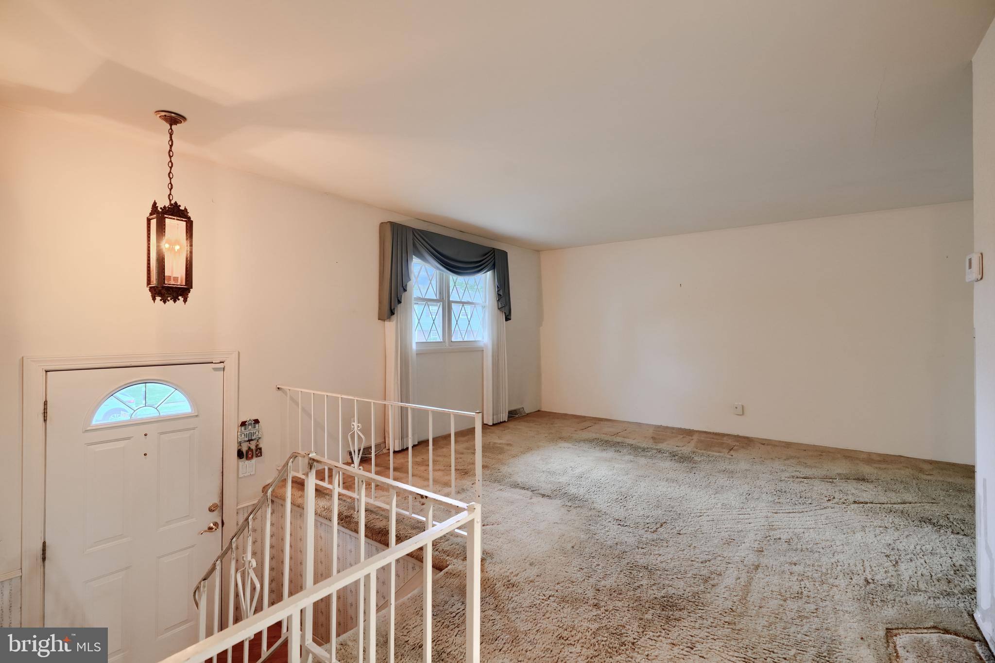 113 Doncaster Road Joppa, MD 21085 - Photo 5 of 43 a view of entryway with a window