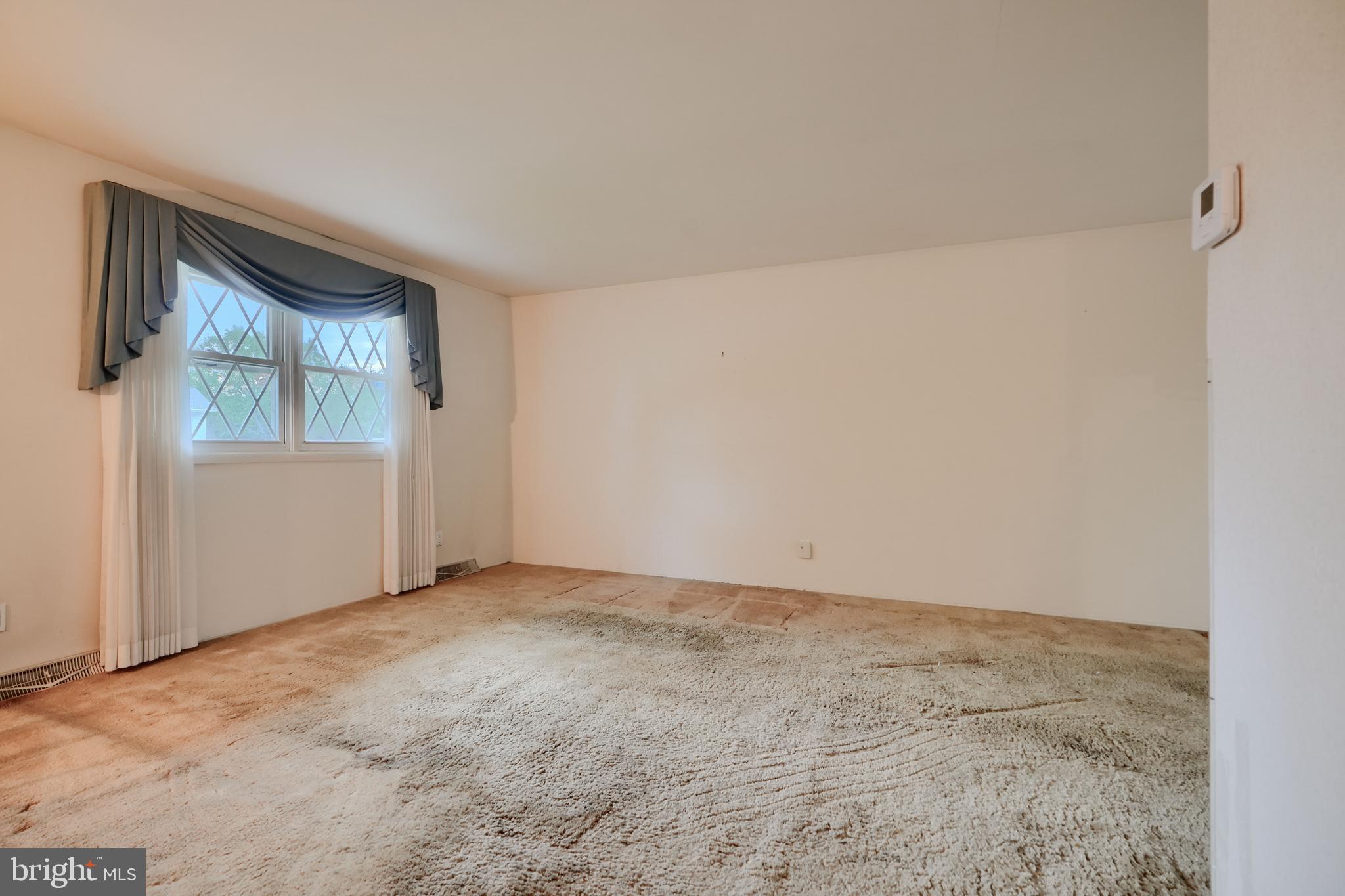 113 Doncaster Road Joppa, MD 21085 - Photo 6 of 43 an empty room with windows