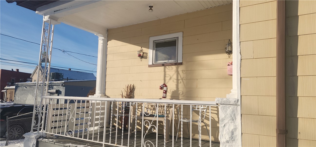 14 Ketchum Street Rochester, NY 14621 - Photo 2 of 13 Side Exterior, porch to first floor unit