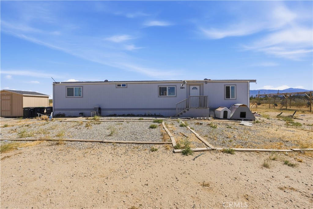 5885 Dos Palmas Road Phelan, CA 92371 - Photo 1 of 40 a view of a terrace