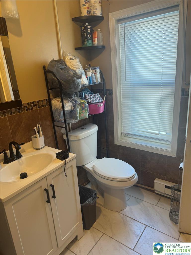 911 Marion Street Reading, PA 19604 - Photo 11 of 16 a bathroom with a sink and toilet