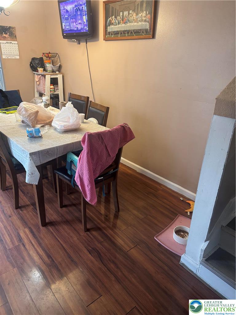 911 Marion Street Reading, PA 19604 - Photo 3 of 16 a view of a dining room with furniture and wooden floor