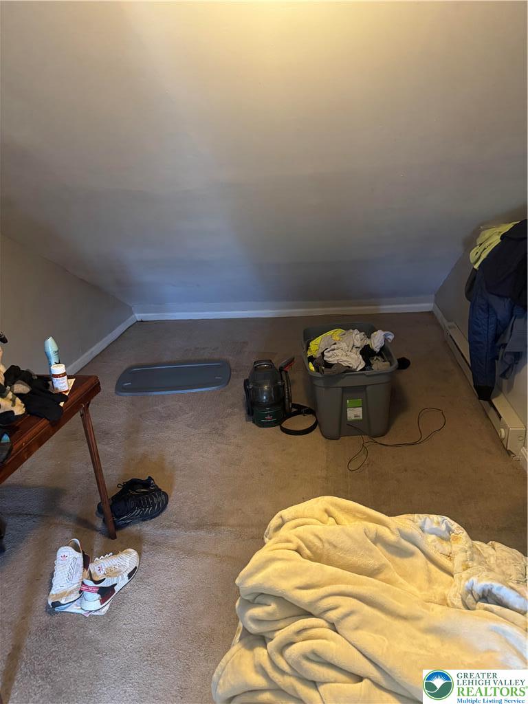 911 Marion Street Reading, PA 19604 - Photo 5 of 16 a bedroom with a bed and cabinets