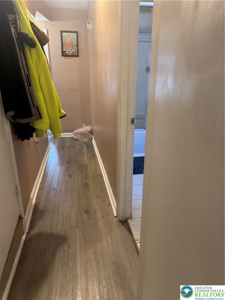 911 Marion Street Reading, PA 19604 - Photo 7 of 16 a view of a closet with wooden floor