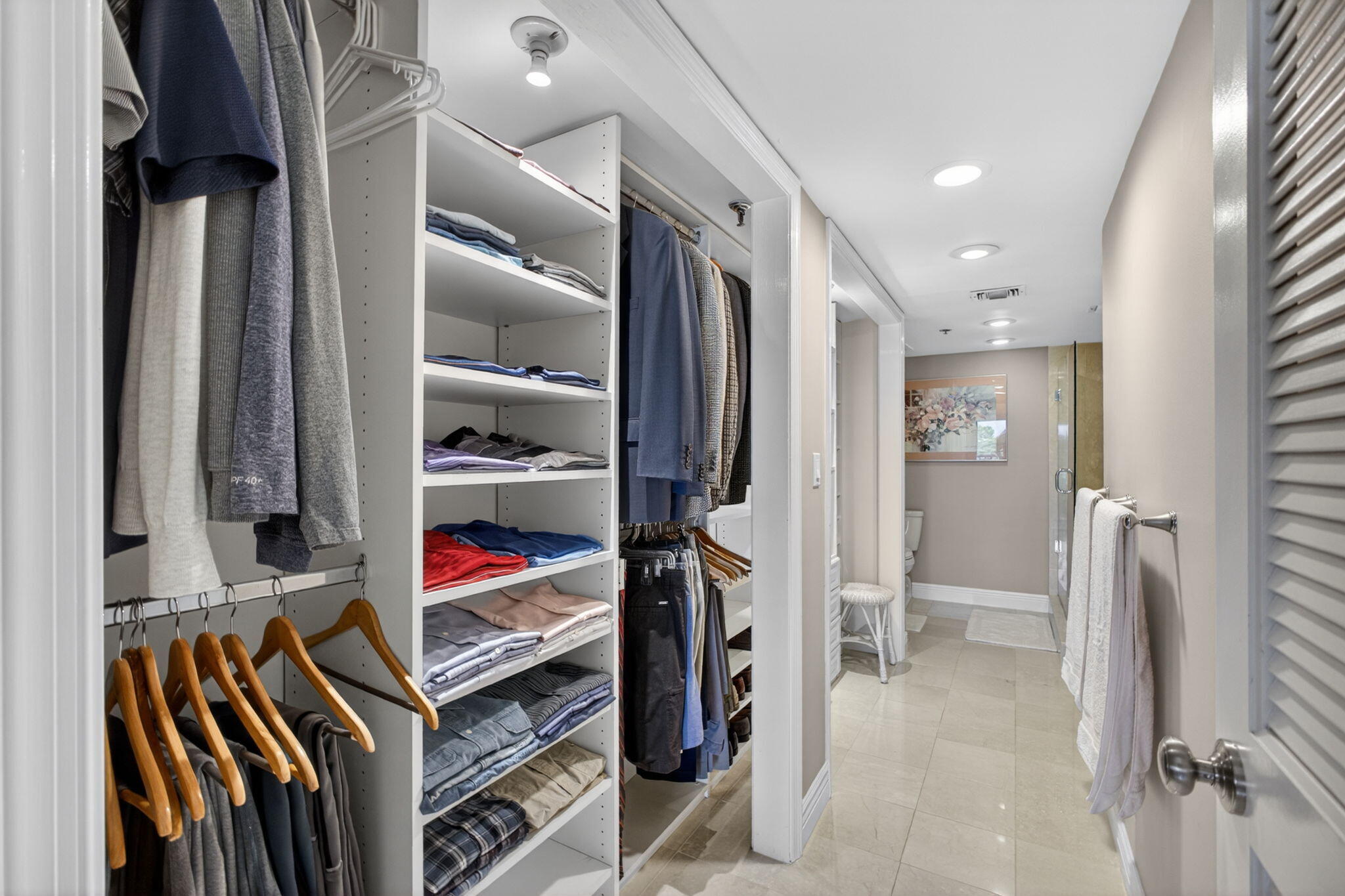 364 Golfview Road, Unit 506 North Palm Beach, FL 33408 - Photo 37 of 68 Primary Closet into Bathroom