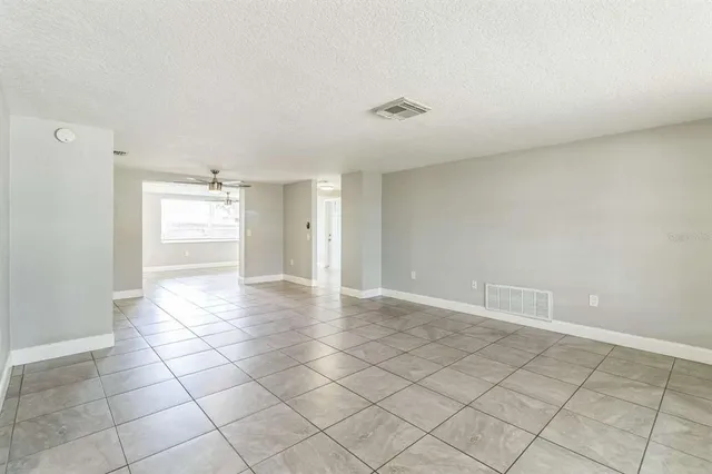 a view of an empty room and window