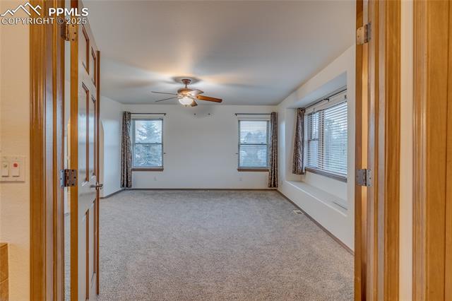 7501 Tudor Road Colorado Springs, CO 80919 - Photo 19 of 48 Double door entry to primary bedroom