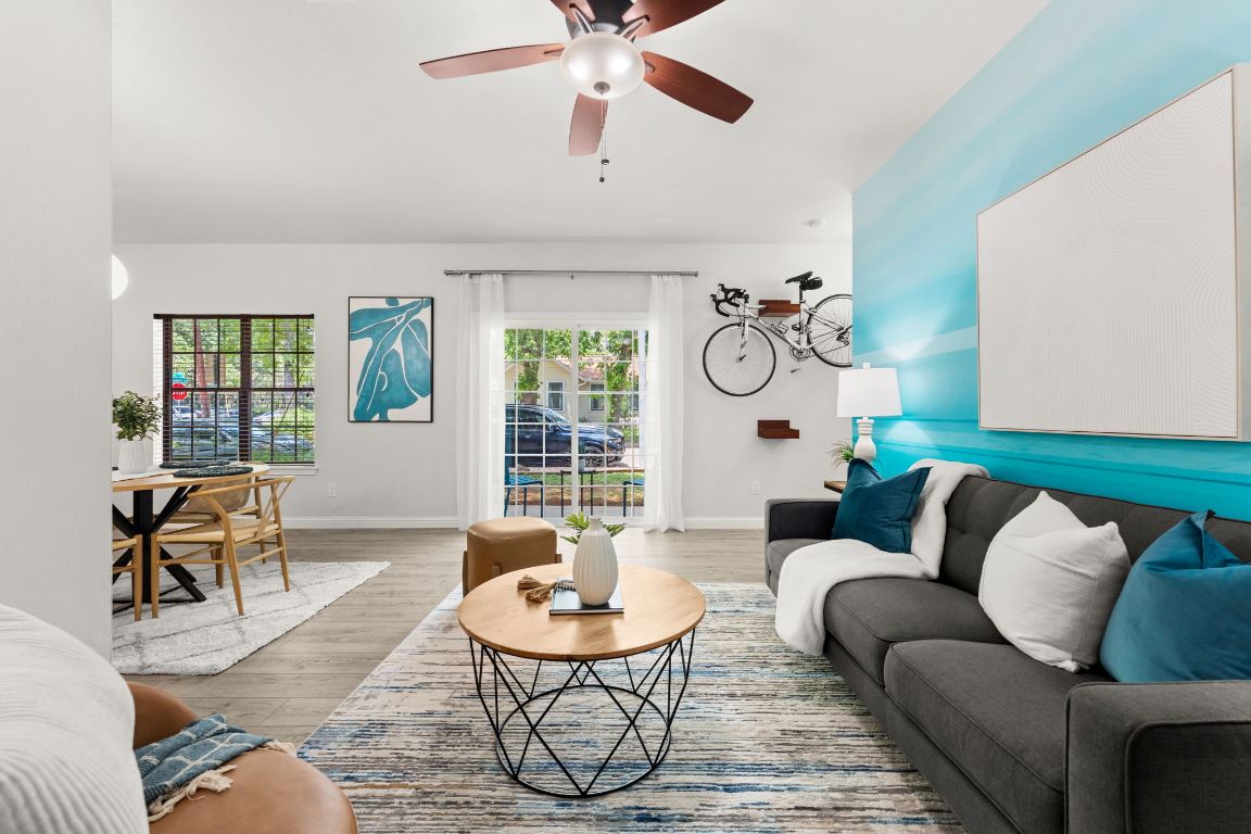 4015 Speedway, Unit 1 Austin, TX 78751 - Photo 1 of 1 a living room with furniture potted plant and a window