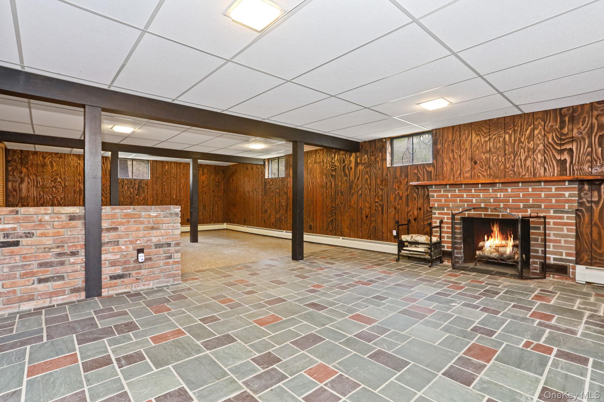 770 Gahbauer Road Hudson, NY 12534 - Photo 16 of 39 a view of a livingroom with a fireplace and window