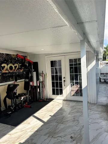 a view of a chairs and a garage