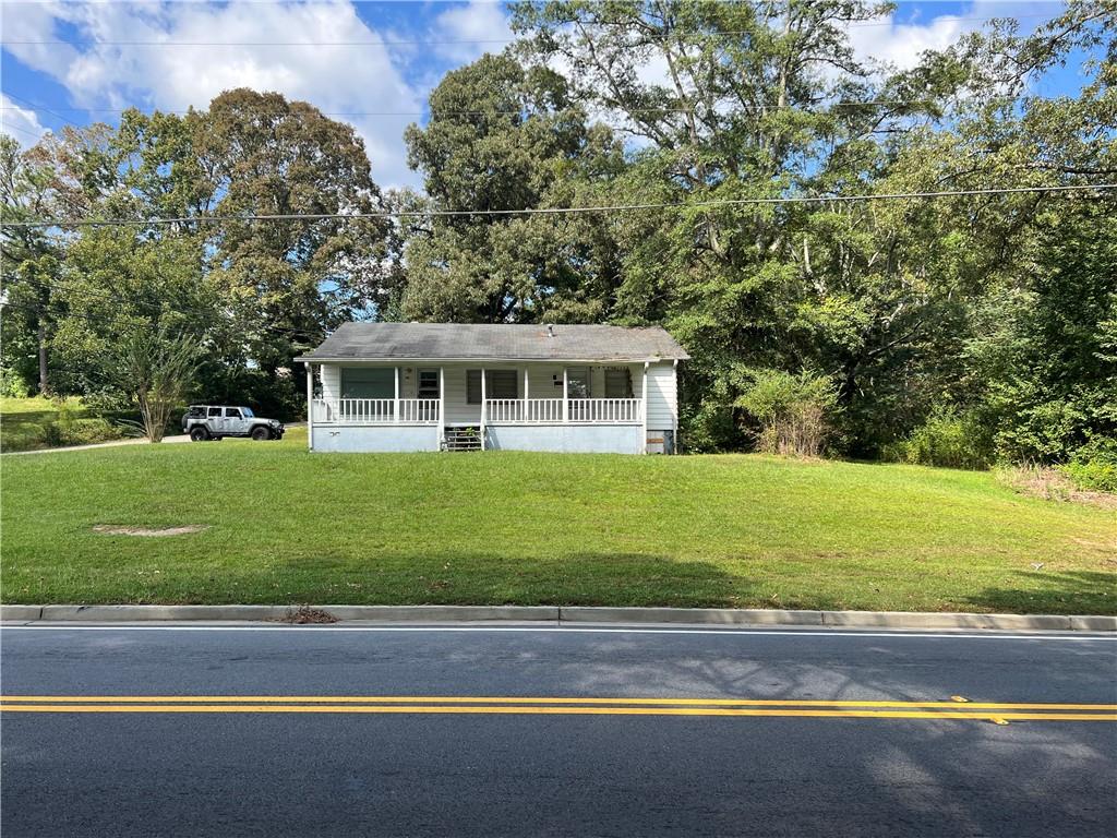 1546 South Gordon Road Southwest Austell, GA 30168 - Photo 1 of 1 a view of a house with a swimming pool