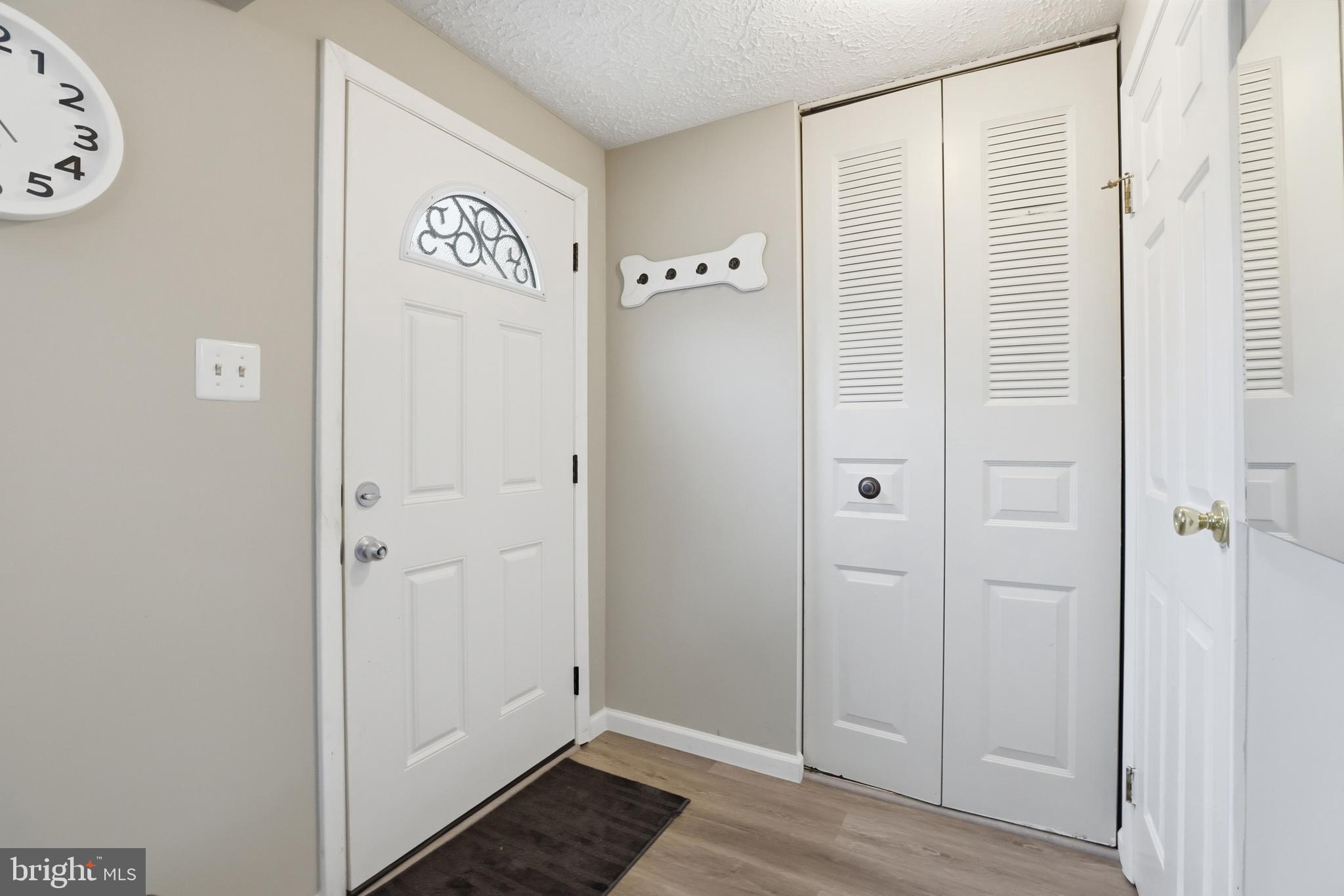 10504 Apple Ridge Road Gaithersburg, MD 20886 - Photo 2 of 33 a view of a bathroom with wooden floor