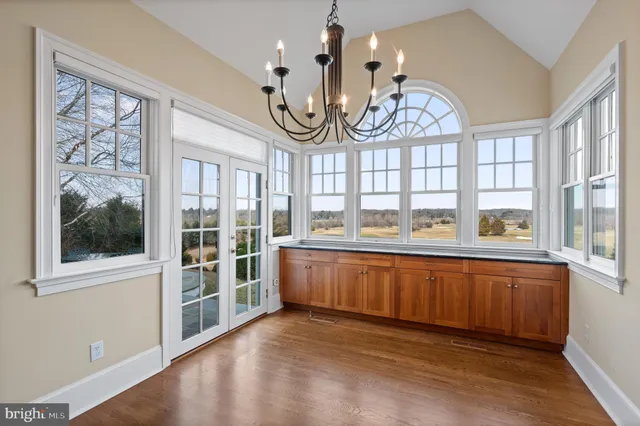 a view of a livingroom with furniture and window