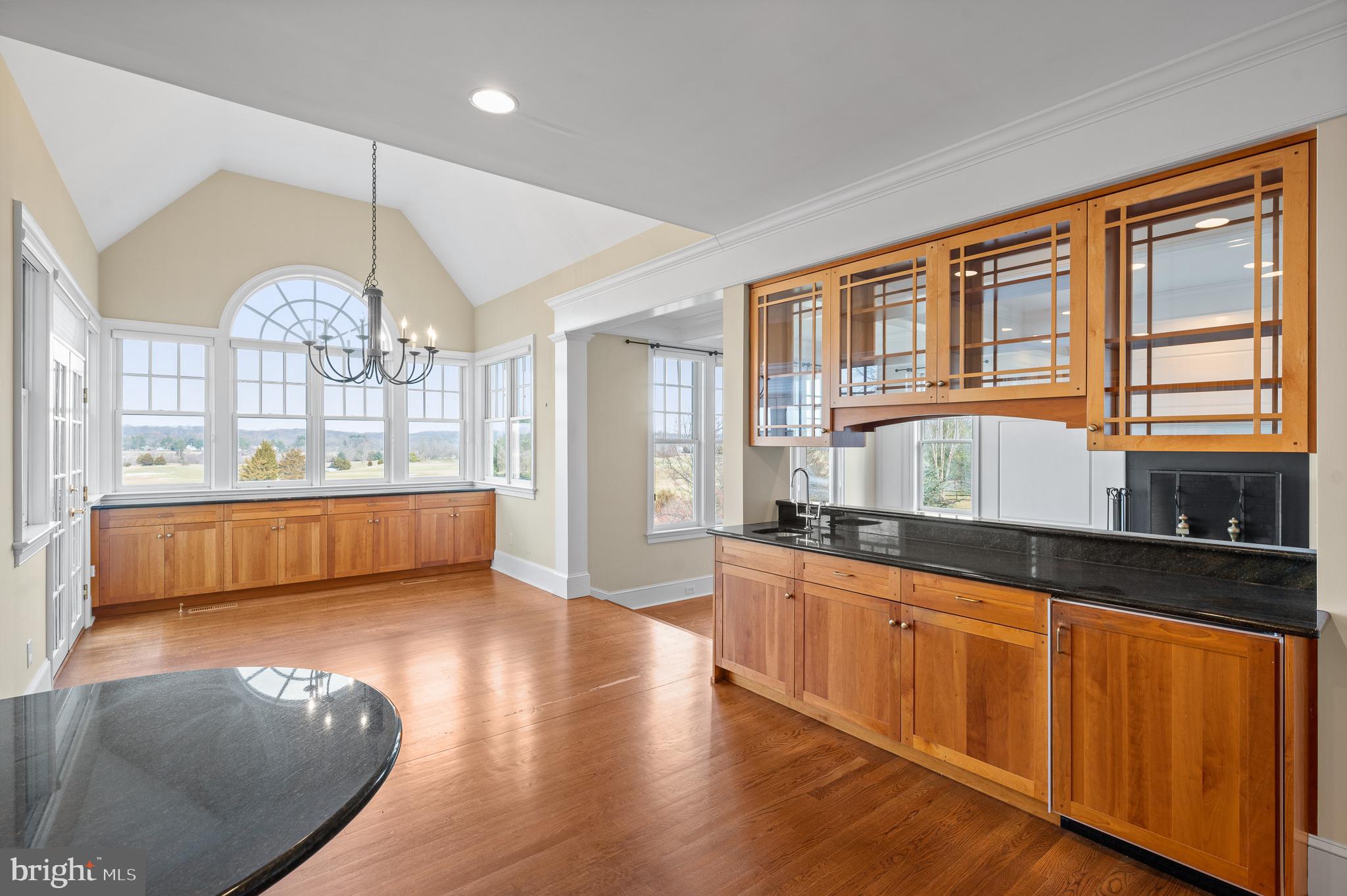 1659 Boot Road West Chester, PA 19380 - Photo 22 of 65 a large kitchen with granite countertop a large window a sink and stainless steel appliances
