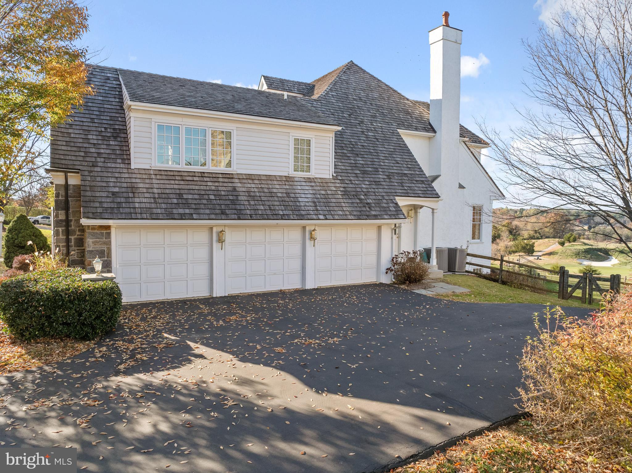 1659 Boot Road West Chester, PA 19380 - Photo 57 of 65 a front view of a house with a yard and garage