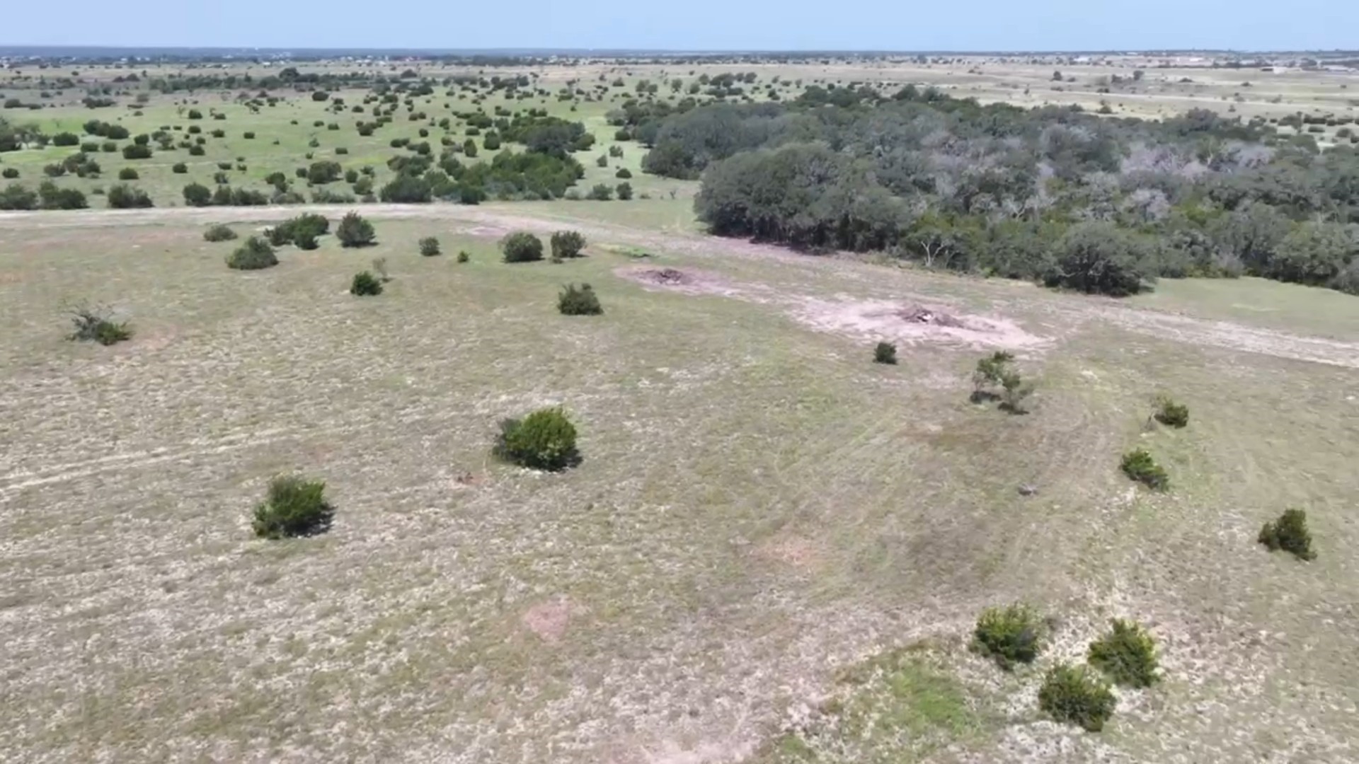 276 County Road 276 Bertram, TX 78605 - Photo 7 of 23 a view of a dry yard with wooden fence