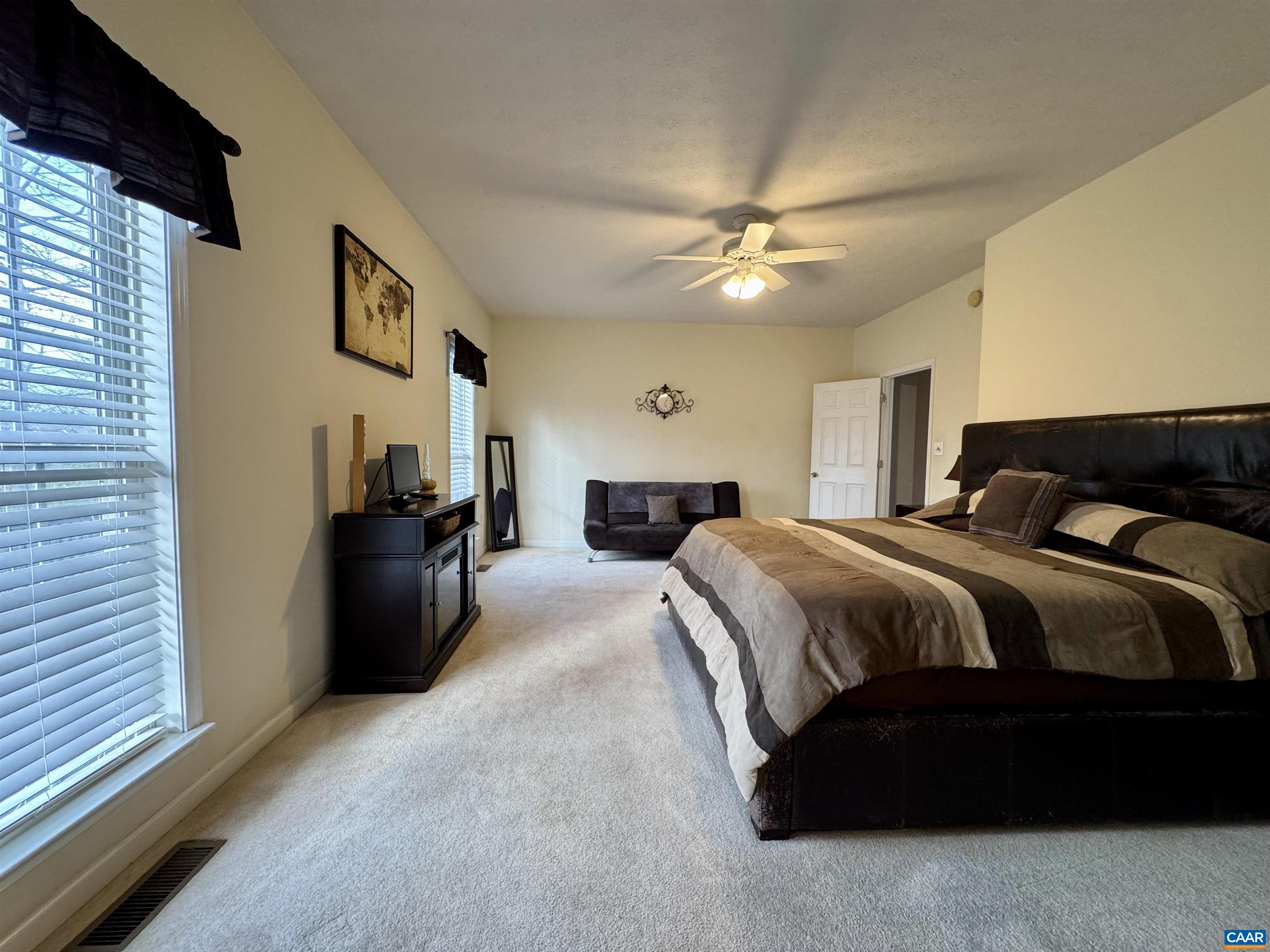 18 Forest View Lane Fishersville, VA 22939 - Photo 23 of 66 a bedroom with a bed and a chandelier