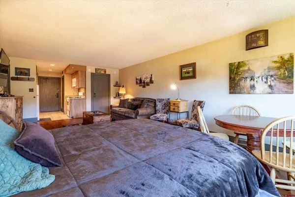 a bedroom with furniture and a couch