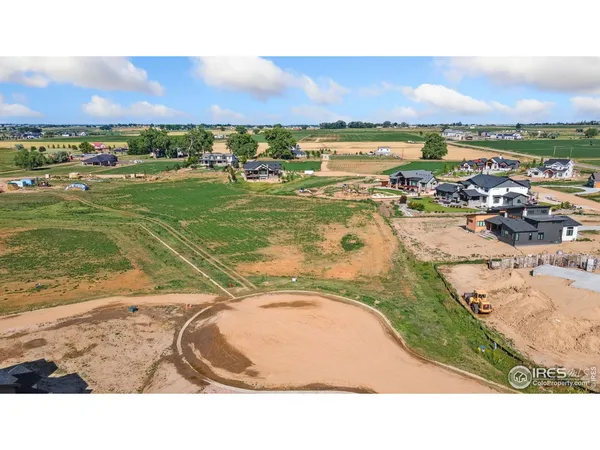 a view of a swimming pool and an outdoor space