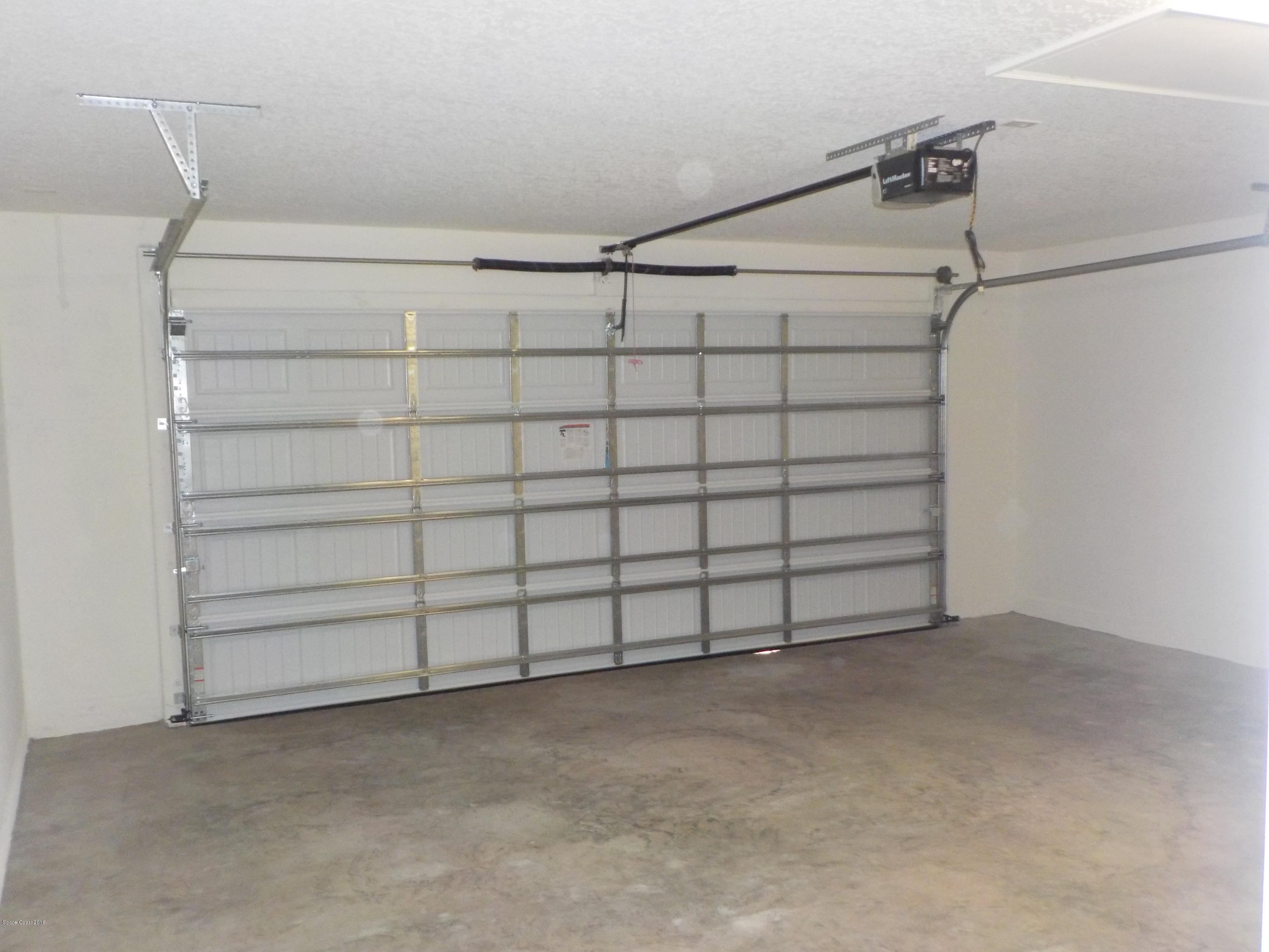 6150 Adina Road Cocoa, FL 32927 - Photo 13 of 13 a view of a garage