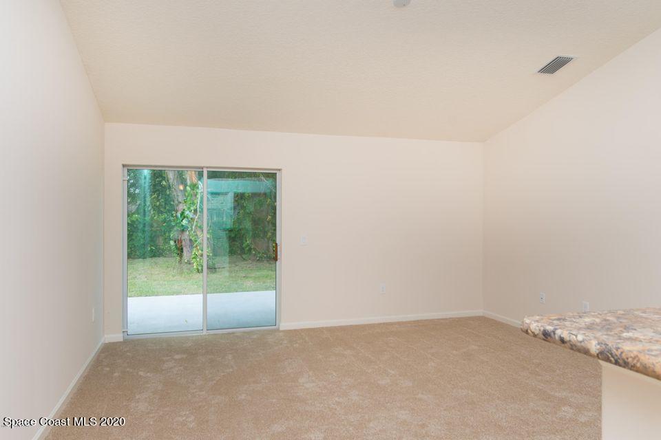 6150 Adina Road Cocoa, FL 32927 - Photo 5 of 13 a view of an empty room