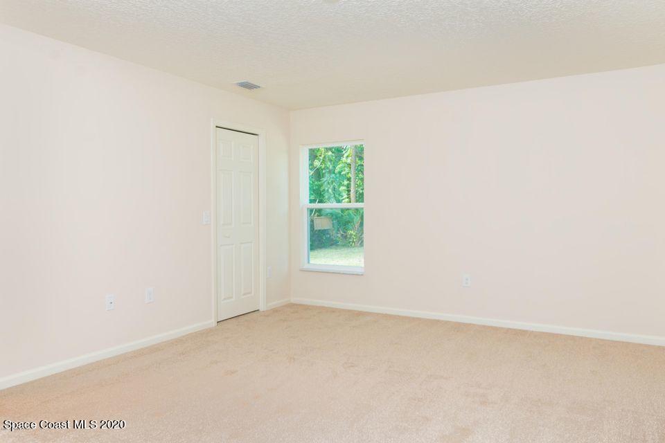 6150 Adina Road Cocoa, FL 32927 - Photo 7 of 13 a view of a room that has a window in it