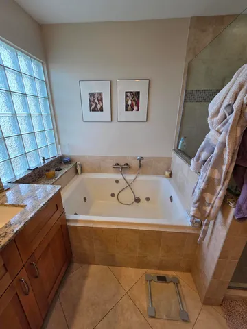 a bath tub sitting in a bathroom