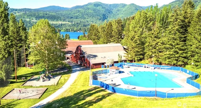 a view of a park with iron fence