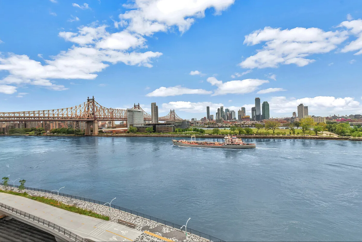 45 Sutton Place South, Unit 14F Manhattan, NY 10022 - Photo 17 of 20 a view of a city