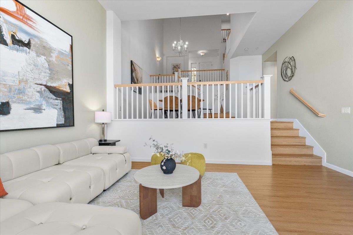 133 Cliff Swallow Court Brisbane, CA 94005 - Photo 12 of 39 a living room with furniture and wooden floor