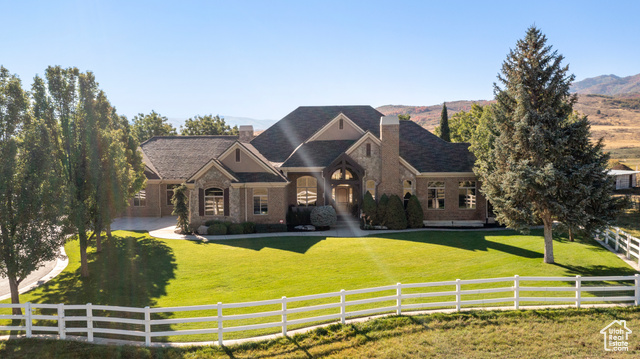 381 Hardscrabble Road Morgan, UT 84050 - Photo 1 of 1 View of front facade with a chimney and stone siding