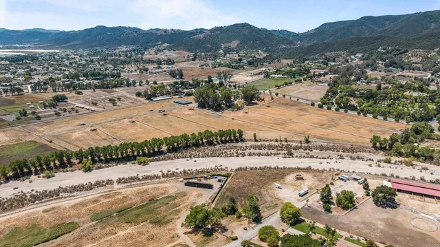 a view of a town with a mountain