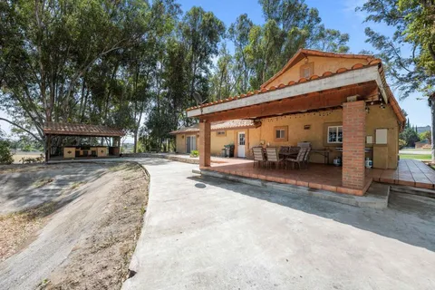a view of street with parked cars