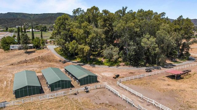 a view of a backyard of the house