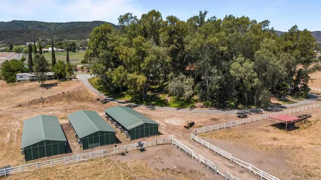 a view of a backyard of the house