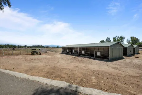 a view of a house with a garden