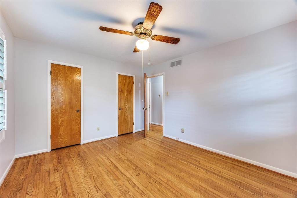 3019 Sharpview Lane Dallas, TX 75228 - Photo 18 of 26 a view of a room with a ceiling fan