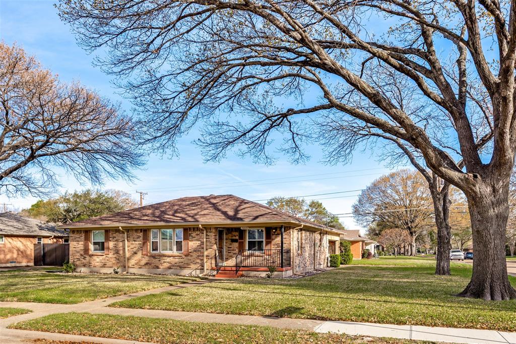 3019 Sharpview Lane Dallas, TX 75228 - Photo 2 of 26 a front view of a house with a yard